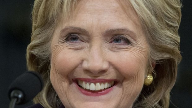 Hillary Clinton, former US secretary of state and 2016 Democratic presidential candidate, smiles during a House select committee on Benghazi hearing.