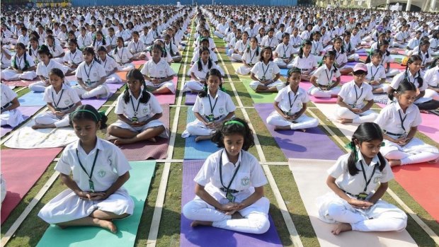 Indian students of Delhi Public School perform yoga in Hyderabad. Indian Prime Minister Narendra Modi has appointed a Yoga Minister in a major revamp of his government in a bid to promote the ancient practice.