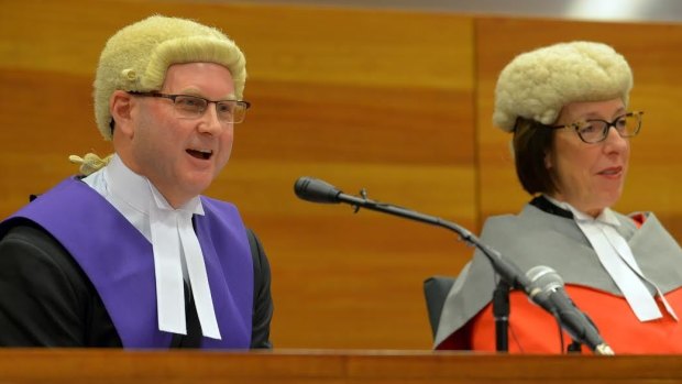New Chief Judge Peter Kidd on the bench at his welcome with the Chief Justice of Victoria Marilyn Warren.