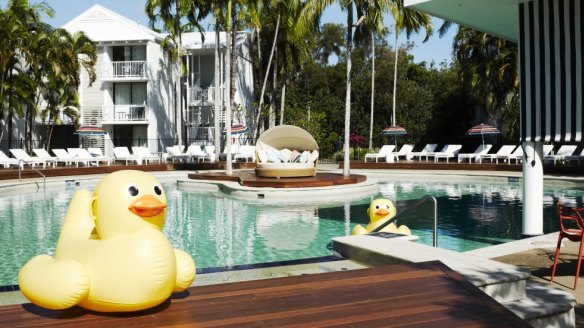 The pool is filled with inflatable animals at QT Port Douglas.