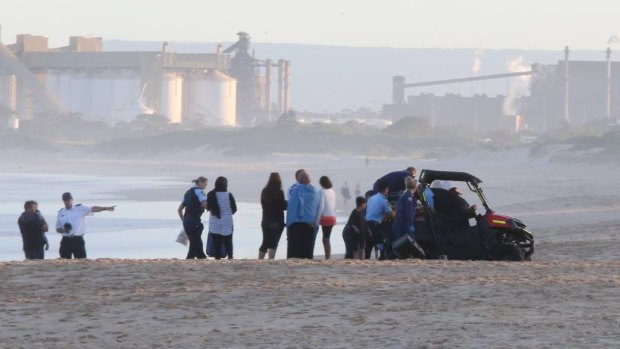 Emergency services at Wollongong City Beach, where a man drowned.