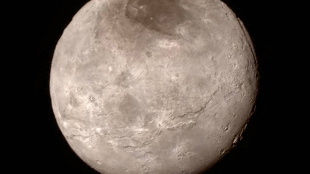 A close-up of Pluto's largest moon, Charon.