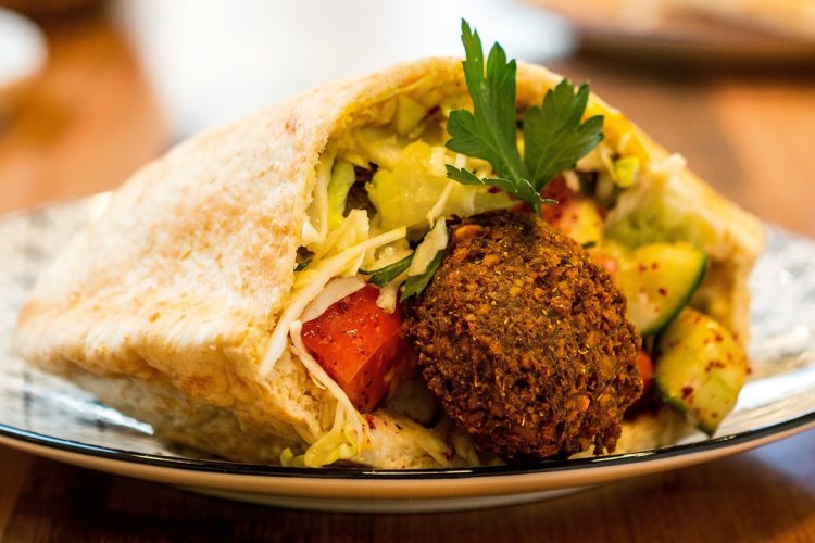 Just Falafs' falafel filled pita pocket.