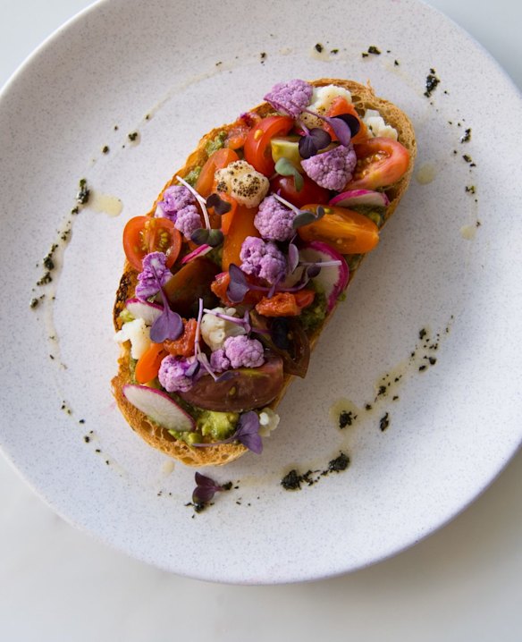 Avo Pesto Toast with purple brussels sprouts.