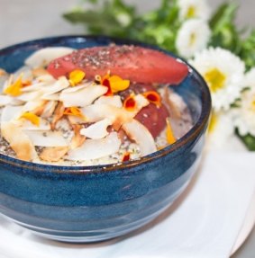 Chez Dre's Quinoa and  coconut porridge with poached seasonal fruits, chia seeds and pistachio praline.