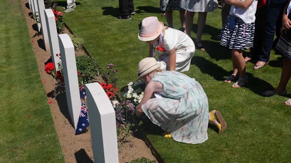 Australians lay flowers in memory of those lost at Fromelles.