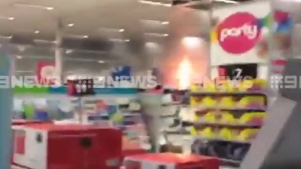 Flames could be seen in footage shot of the Kmart at the Logan shopping centre.