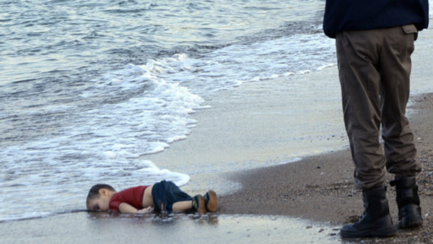 The image of Alan Kurdi, whose lifeless body washed up on a Turkish beach.
