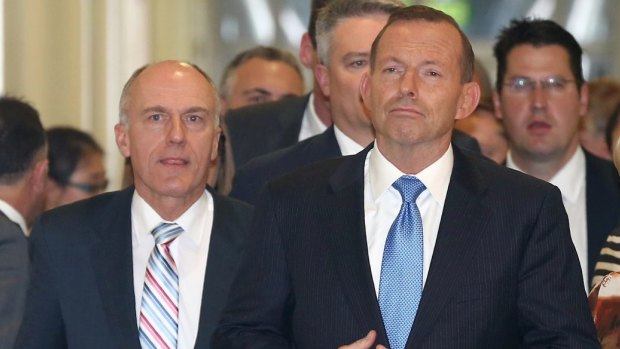 Eric Abetz departed the party room meeting by Tony Abbott's side after Abbott lost the leadership ballot.