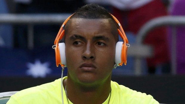 In the zone: Nick Kyrgios and his headphones.