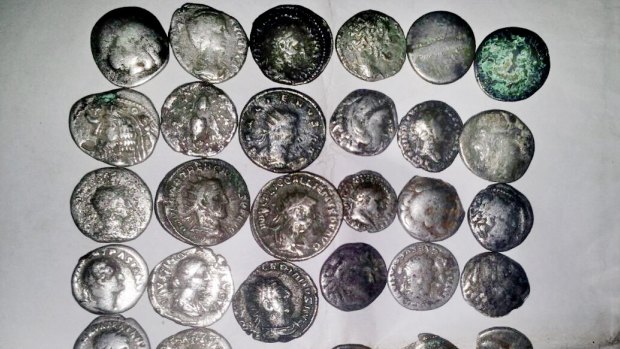 Coins looted from archaeological sites in Deir el-Zour and displayed for sale by IS in Syria.