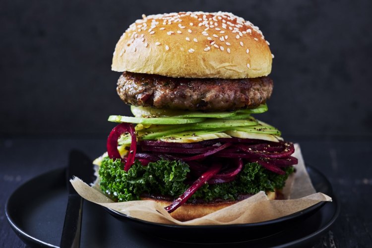 Pork burger with smoky apple BBQ sauce and kale slaw.