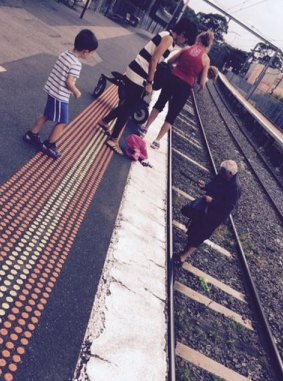 The toddler fell onto the tracks at Diamond Creek train station about 11am.