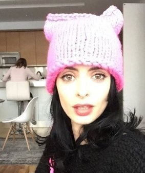 Actress Krysten Ritter shows off her very own pink pussy hat. 