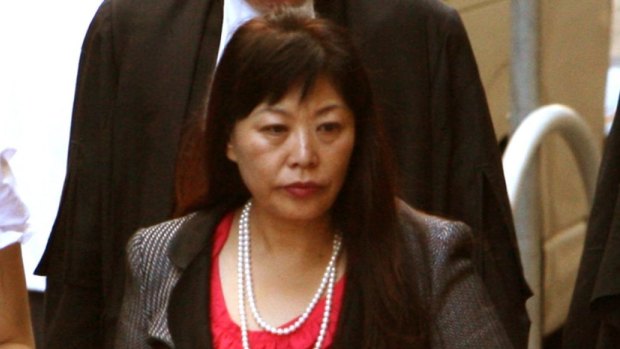 Helen Liu enters court for a defamation case in 2011.