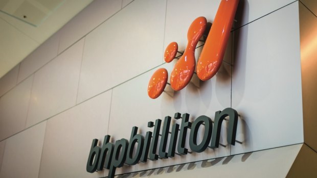 BHP Billiton's iron ore output was hampered by the Samarco dam disaster and a train derailment in the Pilbara.