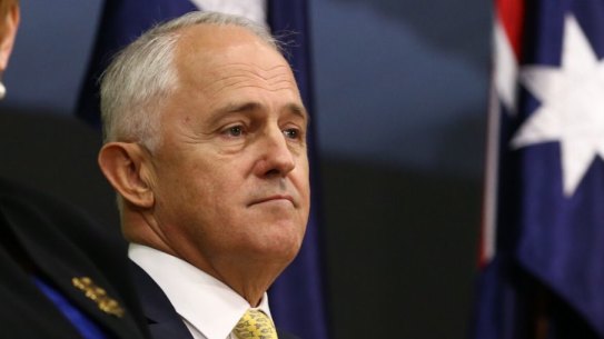 Prime Minister Malcolm Turnbull launches his 2016 Defence white paper with Defence Minister Marise Payne backed by just two Australian flags.