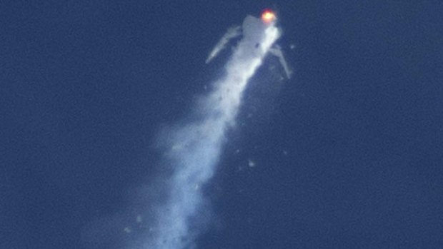 The Virgin Galactic SpaceShipTwo rocket explodes in mid-air during a test flight above the Mojave Desert in California. 