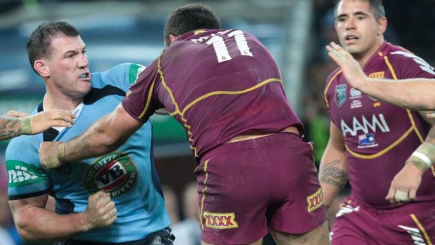 Nate Myles and Paul Gullen fight during the first half of Origin 1 in 2013.