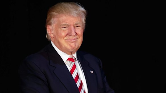 Ivanka Trump smiles at her father, Republican presidential candidate, Donald Trump.