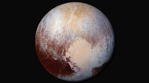A new combination of images captured by the New Horizons spacecraft with enhanced colours to show differences in the composition and texture of Pluto's surface. The images were taken when the spacecraft was 450,000 kilometres away. 