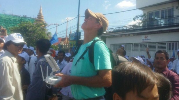 In this photo from Cambodian website Fresh News, Australian filmmaker James Ricketson is seen apparently operating a drone.