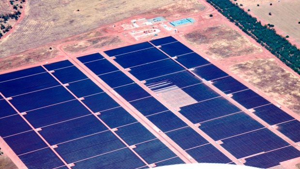 Australia's largest solar power plant gets the last of its 1,366,380 panels.