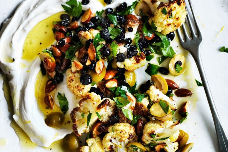 Warm salad of roast cauliflower, labna, olives and almonds.