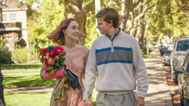  Saoirse Ronan, left, in a scene with Lucas Hedges.