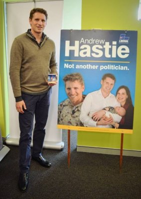Canning MP Andrew Hastie says he won't remove photos of himself in uniform from his federal election campaign material.