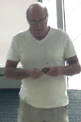 Police believe this man can assist with inquiries about the sexual assault of a shopping centre security guard.