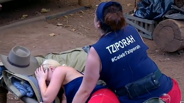Team work:  Keira Macguire cries after a run-in with Steve Price as Tziporah Malkah comforts her.