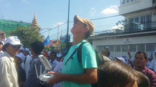 In this photo from Cambodian website Fresh News, Australian filmmaker James Ricketson is seen apparently operating a drone.