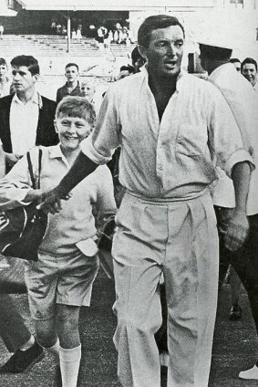John Coates as a youngster with Richard Benaud at the SCG after the 1964 Australia-South Africa Test.