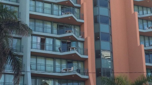 A man was rushed to hospital after being shot in the stomach in a Mantra Crown Towers hotel room on Friday.