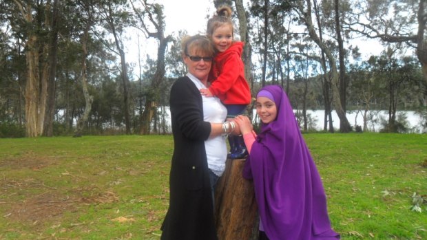 Sydney woman Karen Nettleton pictured with two of her grandchildren who are now trapped in Syria.