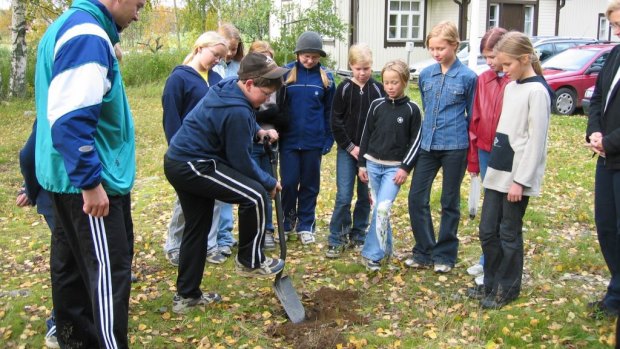 Finnish schoolchildren planting trees. Finland's education results are consistently among the world's best - it has no private schools.