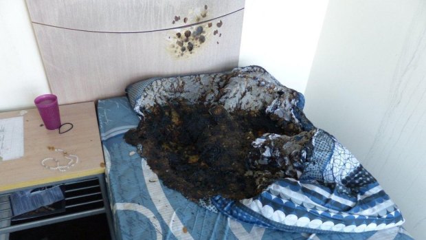 The aftermath of a fire in a Melbourne bedroom sparked by a mobile phone left charging.