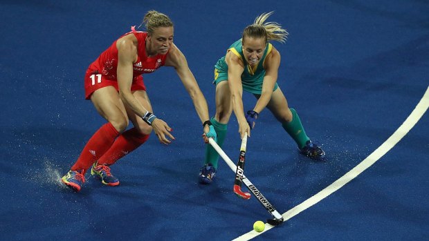 Kate Richardson-Walsh of Great Britain battles Australia's Emily Smith during the Hockeyroos 2-1 loss.