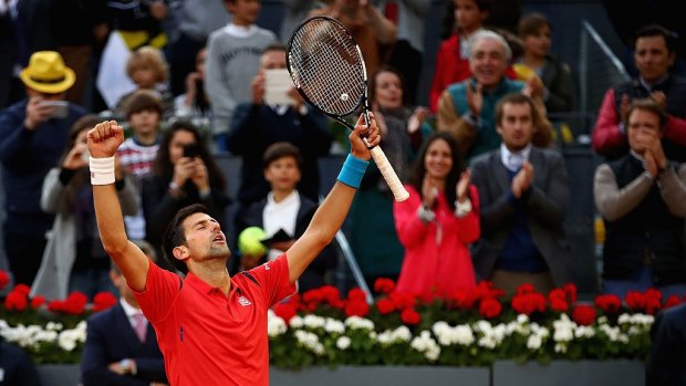 Too strong: Novak Djokovic disposed of Andy Murray in three sets to lift the Madrid Masters trophy for the second time.