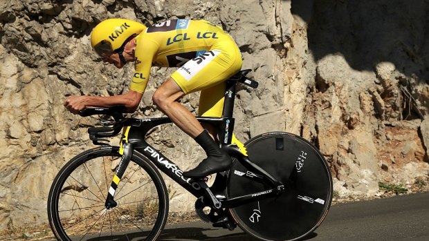 Leading: Chris Froome retained the yellow jersey in the Tour de France in the time trial following the Nice attack.