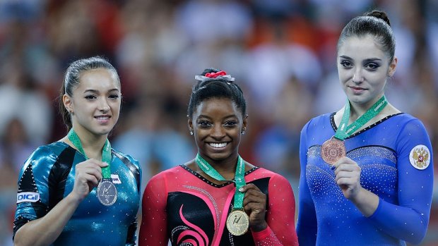 Streak over: Romania's Larisa Lordache (left) won't be competing in the womens gymnastics team event in Rio after Romania failed to qualify, ending a medal streak that goes back to 1976.