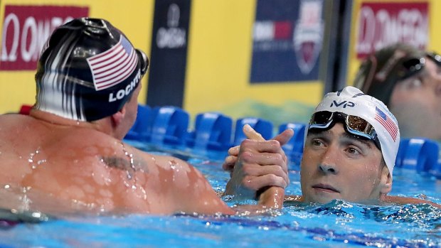 End of an era: Michael Phelps (right) and Ryan Lochte came in 1-2 in their final bout on US soil in the 200m individual medley.