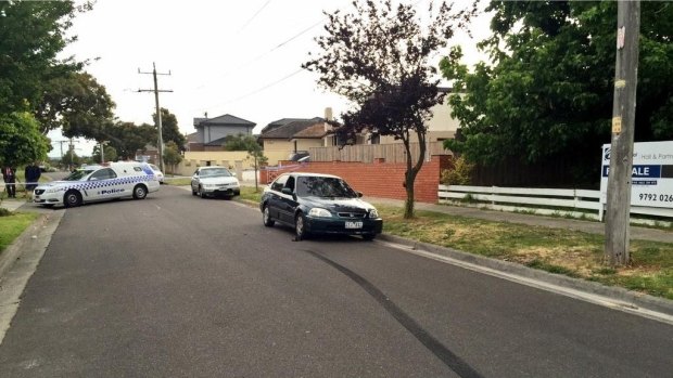 The green Honda Civic was found alight on Dawn Street, Dandenong.