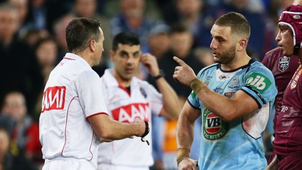 No try: Robbie Farah speaks to referee Gerard Sutton after the bunker decision to deny Josh Morris a try in game one.