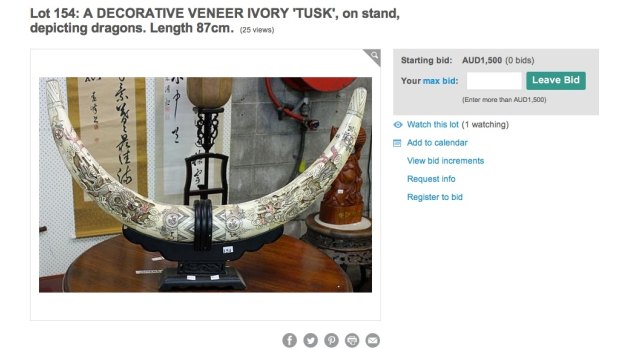 Decorative ivory tusks on an online auction catalogue.