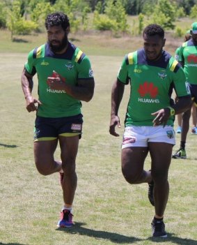 PNG Hunters outside back Kato Ottio, right, was scouted by Raiders recruitment chief Peter Mulholland.
