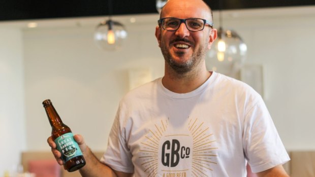 Good Beer Co. founder James Grugeon with a bottle of Great Barrier Beer.