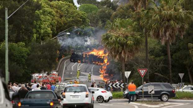 Fireball: The tanker on its side on Mona Vale Road on October 1, 2013.