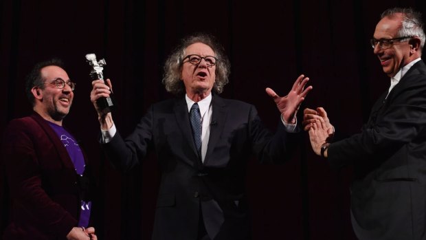 Barrie Kosky (left) and Berlin Film Festival director Dieter Kosslick (right) award actor Geoffrey Rush the Camera award for lifetime achievement. Rush's movie <i>Final Portrait</i> had its world premiere during the 67th Berlin International Film Festival.
